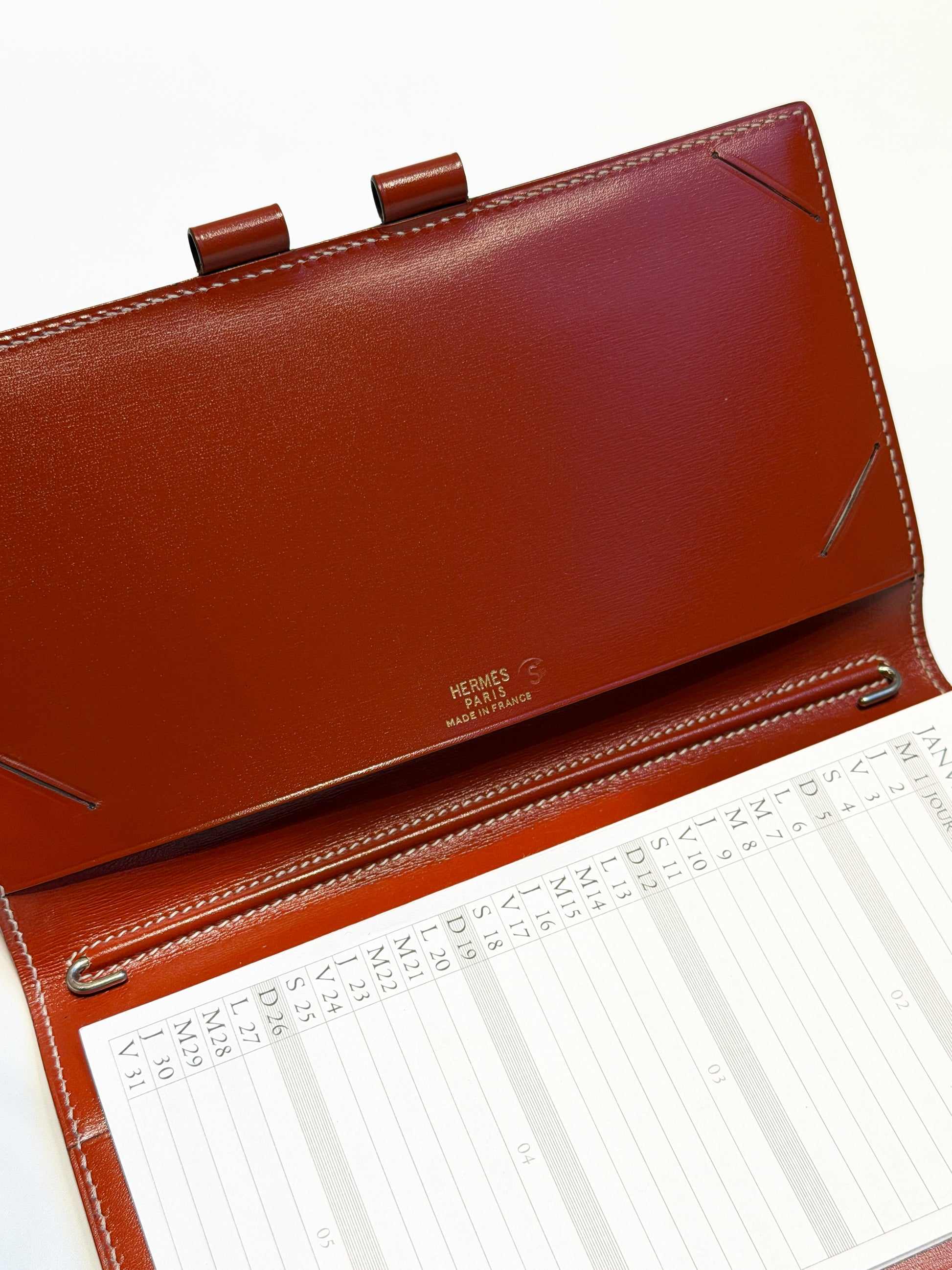 Burgundy Hermès agenda cover